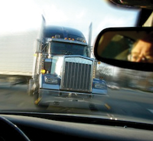 Oncoming truck into car